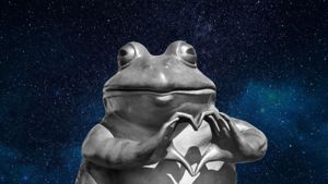 Statue of anthropomorphized frog making heart sign with decorative starry background 