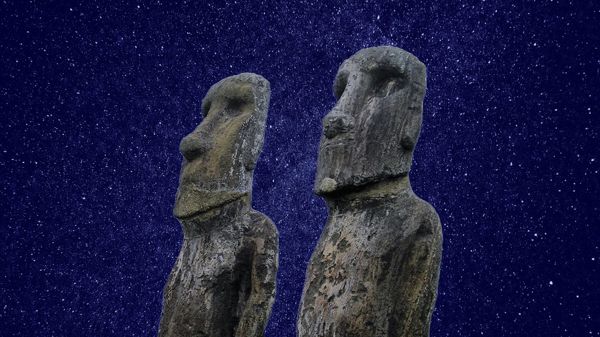 easter island figures against background of starry sky