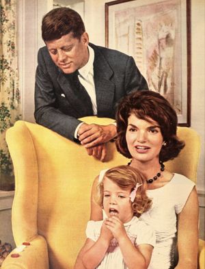 John F. Kennedy and Jacqueline Kennedy, with daughter Caroline